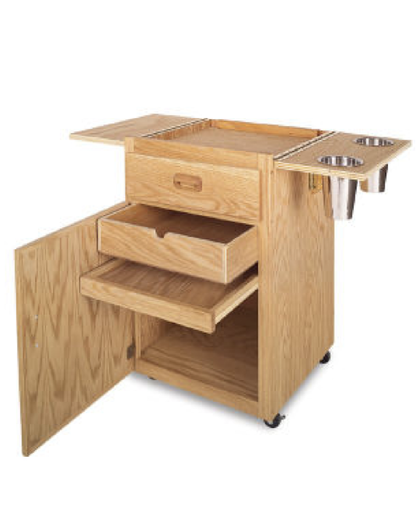 Best's Terrero Taboret is a space-saving work and storage center. It has wings that fold out for an extra large work area, featuring slots for steel canisters (included). The outer supply drawer and cabinet space, including an inner drawer and slide-out utility shelf, provide ample storage space. Terrero is constructed with beautiful, durable, handrubbed, oil-finished solid oak on all four sides, so it can be used anywhere. It has 1-1/8" slots for mounting an optional table easel. The taboret is mounted on front-locking rubber casters for mobility. The Terrero Taboret is the perfect companion for the Best Deluxe Tabletop Easel.Together, the two become an integrated workstation. Some assembly required. Easel and Taboret sold separately.