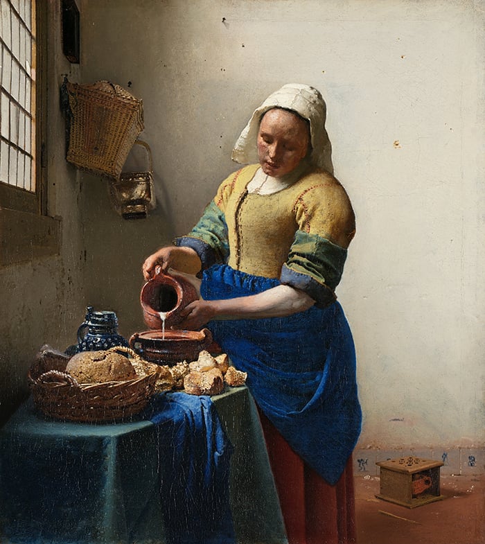 Johannes Vermeer, The Milkmaid, c.1660, as an example of a triadic color scheme